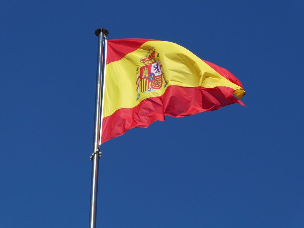 Spanish flag blowing in the wind.